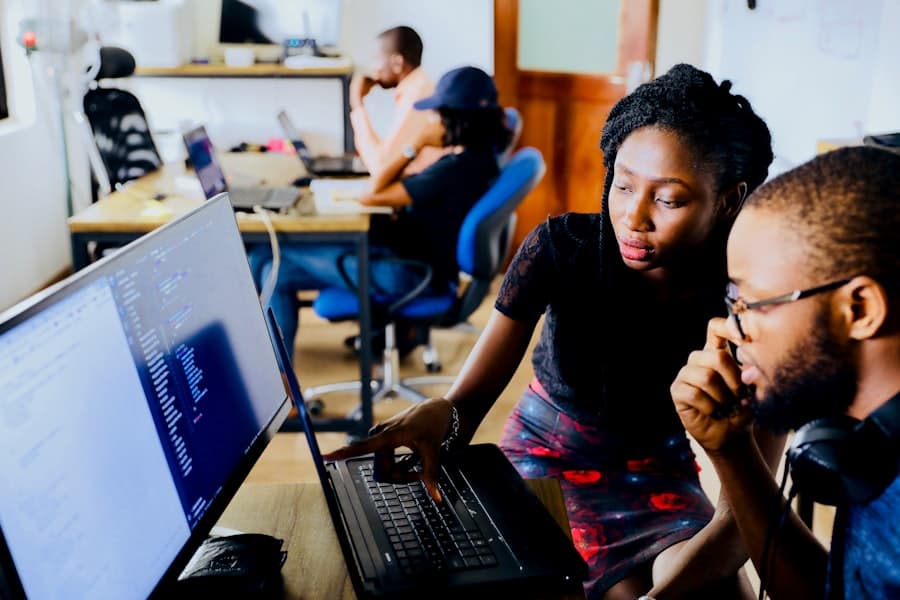 IELTS learners working in a computer classroom
